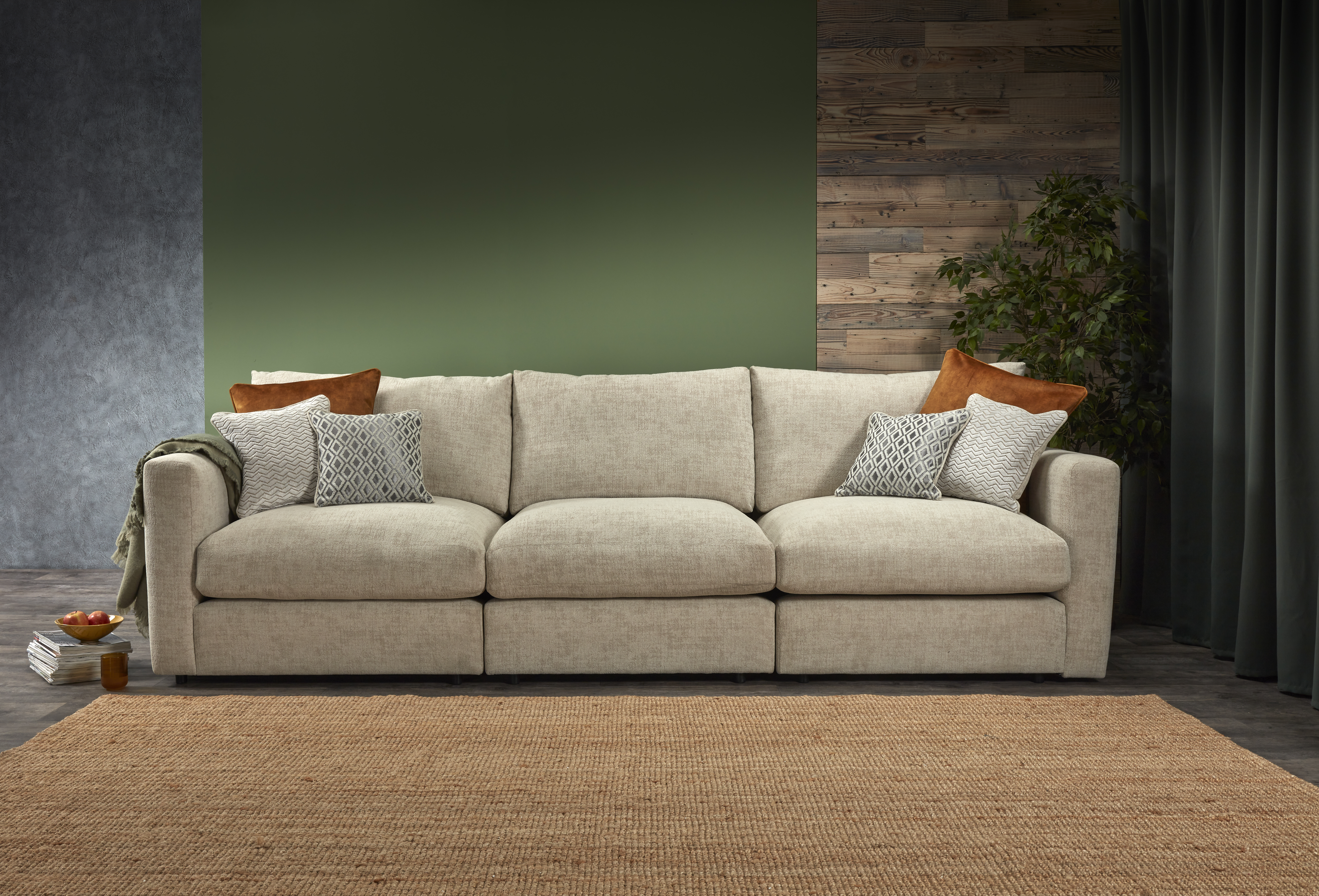 Large beige sofa in green living room